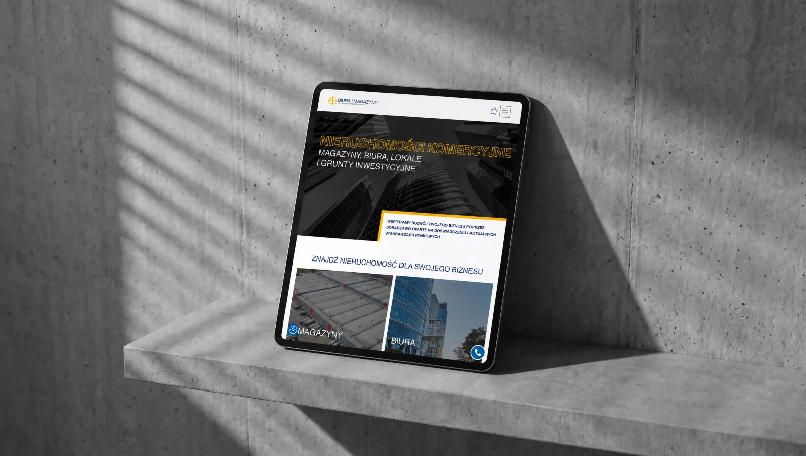 Serwis nieruchomości komercyjnych na tablecie — kafelki kategorii magazyny i biura