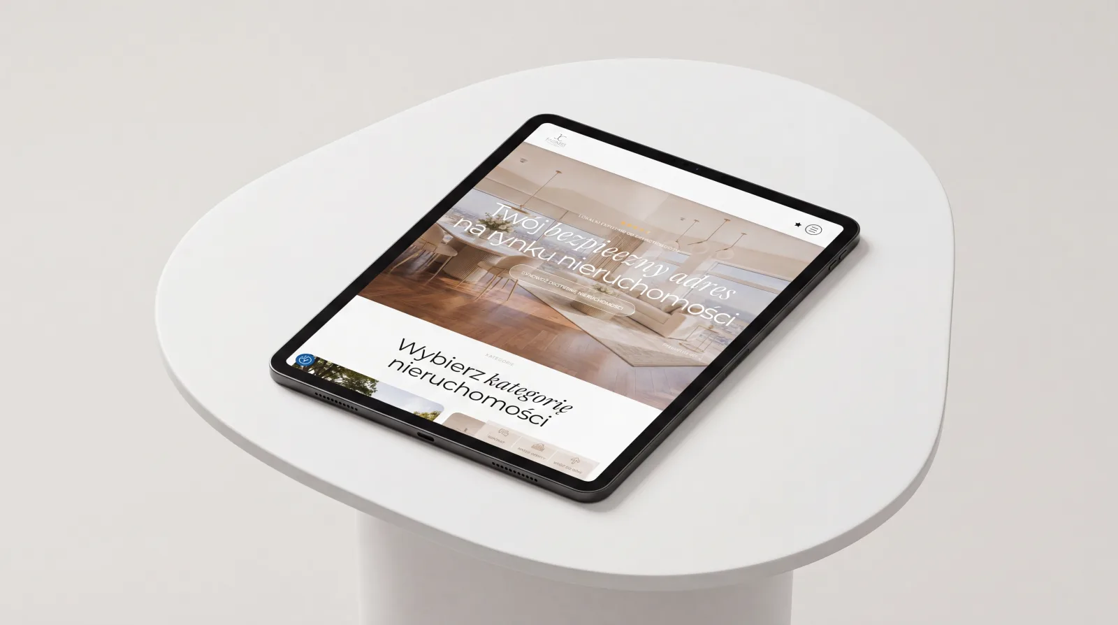 Strona JCPartners Nieruchomości na tablecie — sekcja wyboru kategorii nieruchomości